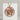 Rising Sun Torii Gate Pendant, rose gold, front view on display pedestal