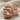 Mountain Gorilla Ring, rose gold, angled three-quarter view on fabric