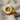 Audio Speaker Ring, gold vermeil, angled view on textured fabric