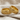 Nordic Bird Ring in gold vermeil, pair angled on linen fabric