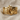 Screaming Wall Ring, gold vermeil, product photo on textured linen