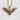 Landing Eagle Pendant, rose gold, front view on textured stone