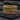 Twisted Rope Last Supper Ring, gold vermeil, front view on slate stone