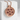 Garnet Seed Pomegranate Pendant in rose gold, front view on display pedestal