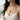 Model wearing the sacred pentagram cremation urn necklace demonstrating pendant size and chain drape