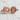 Three Headed Dragon Cufflinks, rose gold, front view on stone surface