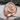 San Judas Signet Ring, rose gold, product photo on stone surface