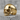 Jawless Skull Ring, gold vermeil, product photo on stone surface