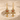 Carnelian Ankh Earring, gold vermeil, front view in sand