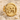 Eye of Horus Earring, gold vermeil, product photo on sand