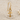 Ankh Drop Earring, gold vermeil, product photo on sand