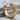 Cracked Brutalist Huggie Earring, gold vermeil, product photo on stone
