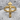 INRI Crucifix Ring, gold vermeil, front view on stone surface