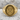 Iron Sharpens Iron Ring, gold vermeil, front view resting on stone