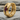 Garnet Brutalist Earring, gold vermeil, product photo on stone