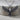 Spread Wing Eagle Pendant, oxidized, front view on wood base