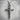 INRI Crucifix Pendant, oxidized, front view on stone pedestal