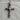 Forged Cross Pendant, oxidized, front view on textured stone display