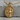 Saint Sebastian Pendant, gold vermeil, product photo resting on stone
