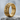 Coiled Dragon Scale Ring, gold vermeil, angled view on stone base