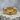 Lucky frog ring, gold vermeil, front studio shot on stone