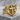 Cross Shield Ring, gold vermeil, angled front view on stone surface