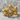 Lucii Crest Ring, gold vermeil, front view on stone surface