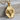 Aries Ram Zodiac Pendant, gold vermeil, product photo on wood