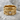 Twin Dragon Ring, gold vermeil, product photo on stone