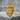 Corrections Officer Badge Pendant, gold vermeil, product photo on stone block