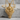 Horned Dragon Head Pendant, gold vermeil, front view on stone