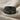 Last Supper Communion Ring, black rhodium plated, front view on fabric