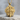 Viking Warrior Sword Pendant, gold vermeil, front view on stone pedestal