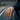 Handcrafted 925 sterling silver Lovers of Mantua ring worn on finger featuring oxidized skeleton signet design