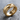 Grooved Piston Ring, gold vermeil, product photo on stone surface