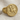 Saint George Dragon Ring, gold vermeil, angled tabletop view