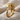 Coiled Alligator Ring, gold vermeil, angled front view on fabric