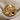 Benjamin Franklin Ring, gold vermeil, front view on textured fabric