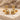 Daisy skull earring, gold vermeil, studio product photo pair