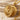 Mushroom Locket Pendant, gold vermeil, open pendant on stone surface