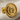 Lydian Lion Coin Earring, gold vermeil, product photo on linen