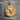 Bull Medallion Pendant, gold vermeil, front view on stone pedestal