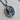 Grim reaper rose pendant, oxidized silver product photo on wood surface