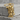 Military Medic Pendant, gold vermeil, front view on stone block