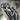 Adam and Eve Paradise Ring, oxidized finish, close-up of sculpted figures