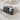 Skull Cloth Ring, oxidized silver, angled view on fabric