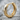 Geometric Faceted Hoop Earring, gold vermeil, angled view on stone