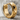 Pyramid hoop earring, gold vermeil, product photo on stone