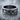 Interlocking Hearts Ring, oxidized silver, front view on stone surface