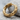 Chiseled Hoop Earring, gold vermeil, angled view on stone